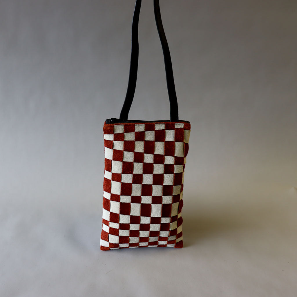 Burnt orange/bone white suede leather bag