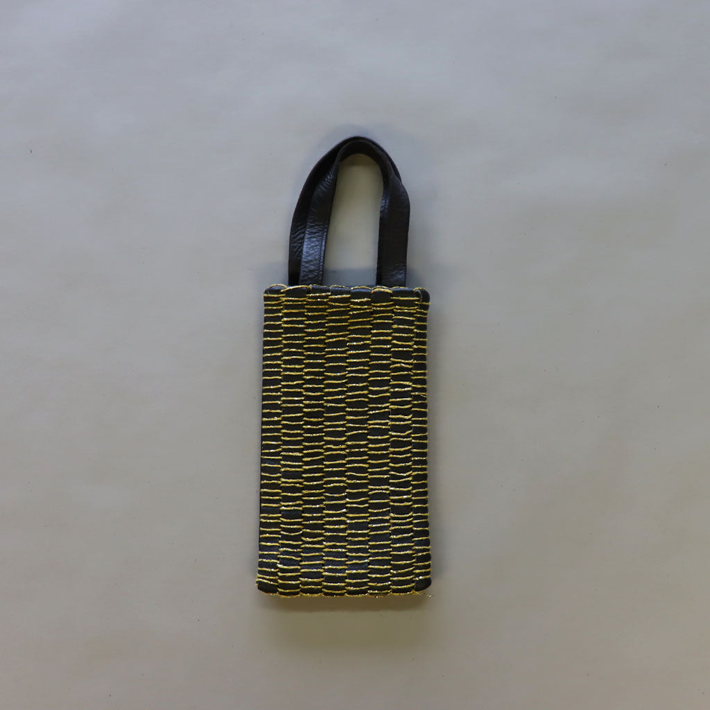Black/ gold loom woven small leather hand bag.