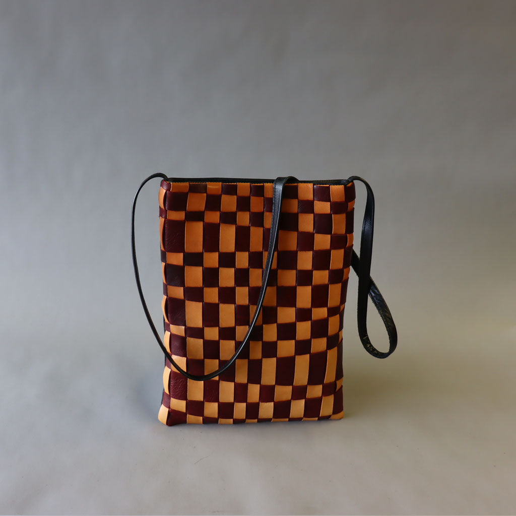 Orange/ Maroon handwoven leather bag