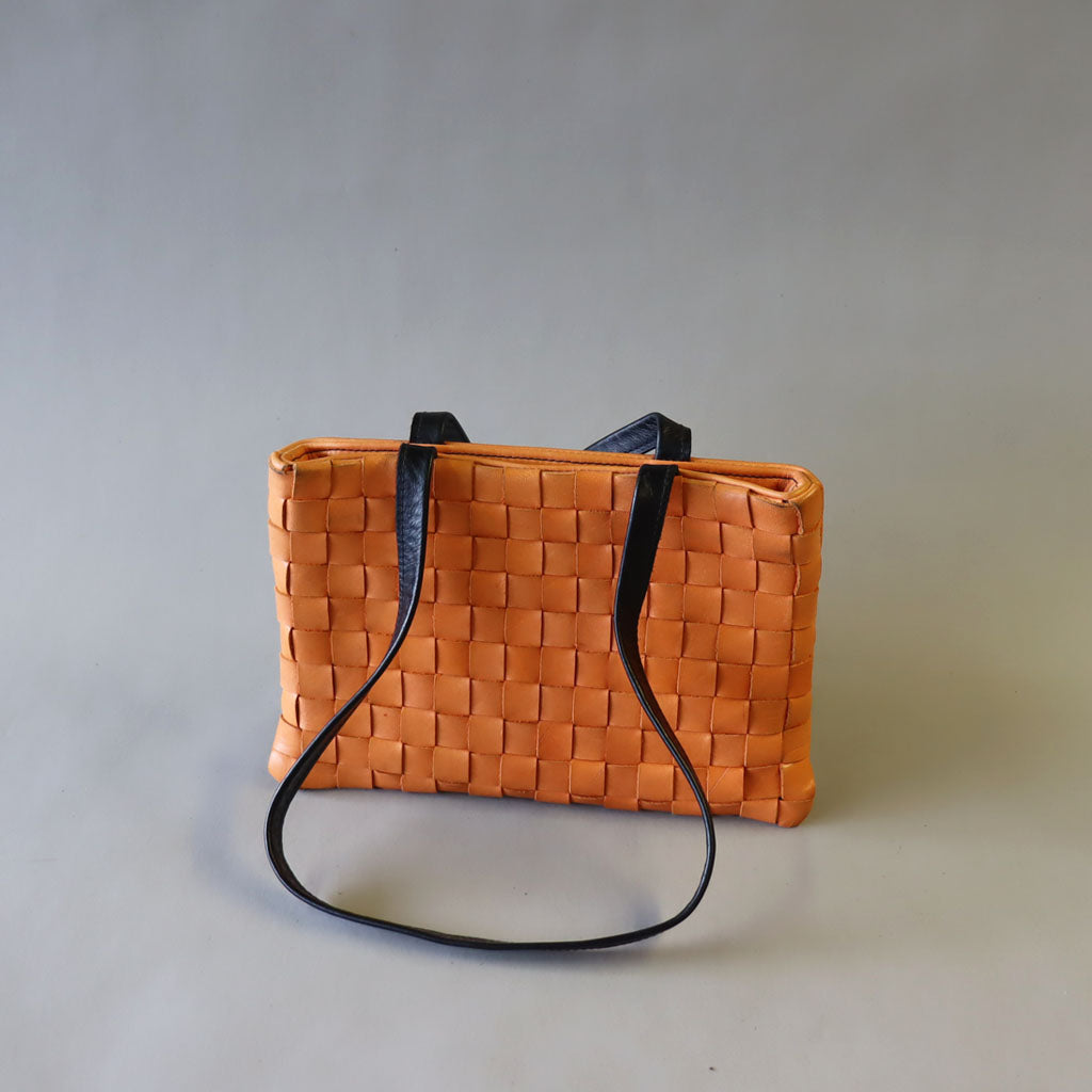 Orange handwoven leather shoulder bag