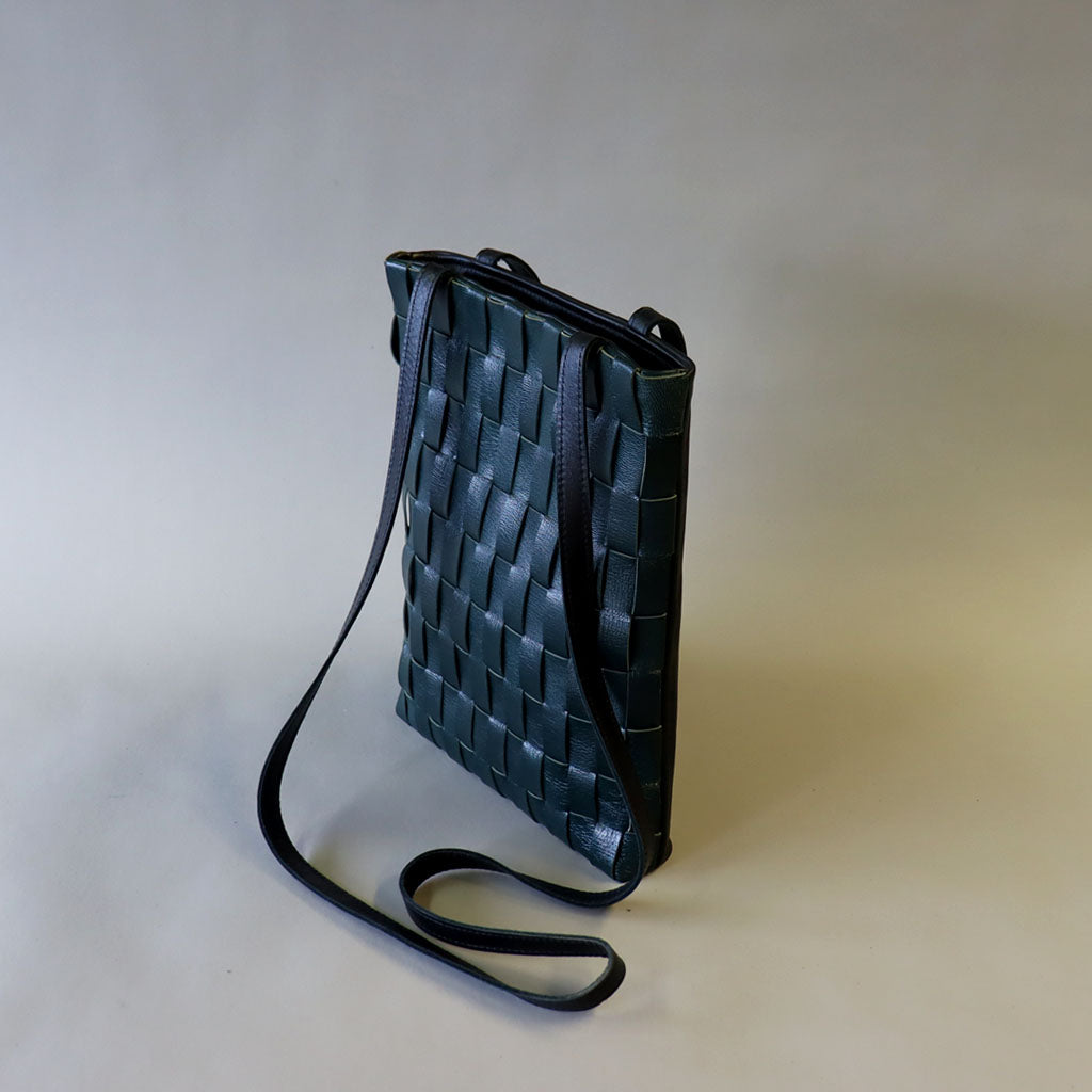 Petrol blue handwoven leather bag